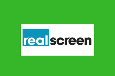 A green background with the words realscreen on it.